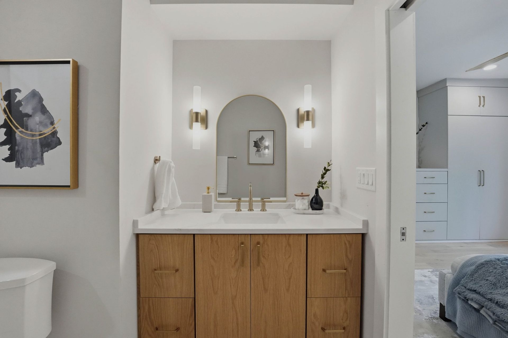 Bath at 608, arched mirror and brass